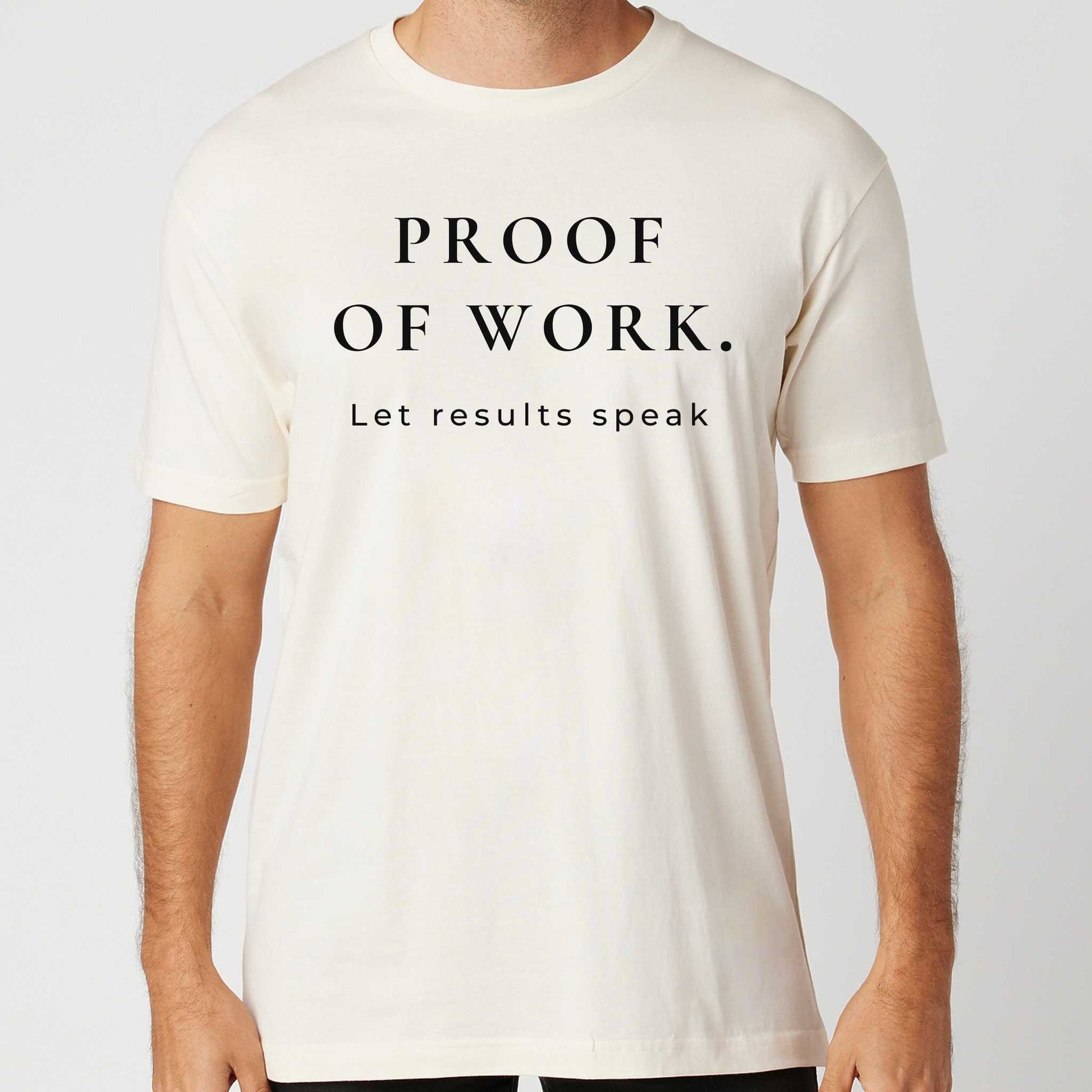 Person wearing an vintage white t-shirt with 'PROOF OF WORK. Let results speak' text on a plain background